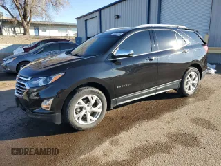 2021 Chevrolet Equinox Premier z VIN 2GNAXNEV3M6153767, wystawiony jako Copart lot #83369204 z przebiegiem 44 267 mil mil oraz Szkoda całkowita • Salvage title. Historia ofert i sprzedaży dostępna na DreamBid. Obrazek 1.