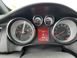2017 Buick Cascada Premium с VIN W04WH3N59HG063877, выставлен на аукционе Copart как лот 73105404 с пробегом 65 085 миль миль и Списание • Salvage title. История ставок и продаж доступна на DreamBid. Изображение 9.