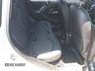 2014 MINI Countryman S with VIN WMWZC3C54EWP27859, listed as a IAAI auction lot 39592610 with 105,264 mi miles and . Bid and sale history available at DreamBid. Image 8.