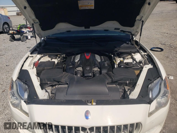 2014 Maserati Quattroporte GTS z VIN ZAM56PPA3E1074957, wystawiony jako Copart lot #52321115 z przebiegiem 113 584 mil mil oraz Szkoda całkowita • Salvage title. Historia ofert i sprzedaży dostępna na DreamBid. Obrazek 11.