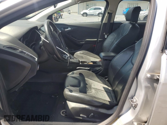 2015 Ford Focus Titanium with VIN 1FADP3J27FL267339, listed as a Copart auction lot 63395835 with 73,372 mi miles and Salvage title. Bid and sale history available at DreamBid. Image 7.