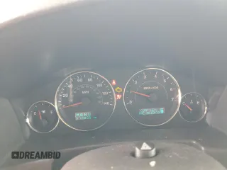 2007 Jeep Commander Sport z VIN 1J8HG48K27C527423, wystawiony jako Copart lot #63448765 z przebiegiem 212 856 mil mil oraz Szkoda całkowita • Salvage title. Historia ofert i sprzedaży dostępna na DreamBid. Obrazek 9.