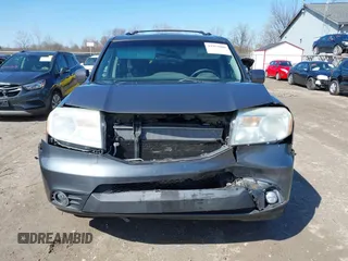 2012 Honda Pilot EX-L with VIN 5FNYF4H55CB040430, listed as a IAAI auction lot 41952800 with 247,175 mi miles and . Bid and sale history available at carsss.com. Image 13.