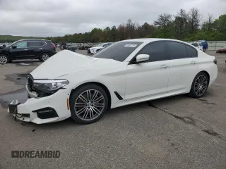 2018 BMW 5 Series 540i xDrive with VIN WBAJE7C57JWD52299, listed as a Copart auction lot 56464155 with 89,437 mi miles and Salvage title. Bid and sale history available at DreamBid. Image 1.
