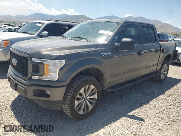 2018 Ford F-150 XL with VIN 1FTEW1EPXJKE71093, listed as a Copart auction lot 63812265 with 122,361 mi miles and Salvage title. Bid and sale history available at DreamBid. Image 1.