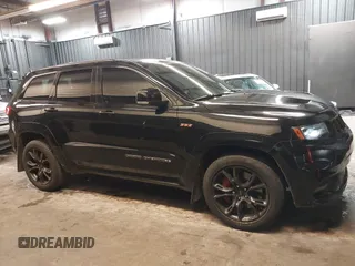 2017 Jeep Grand Cherokee SRT with VIN 1C4RJFDJ9HC819478, listed as a IAAI auction lot 41325490 with 63,551 mi miles. Bid and sale history available at carsss.com. Image 13.