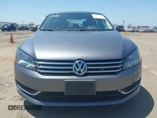 2014 Volkswagen Passat S with VIN 1VWAT7A30EC025433, listed as a IAAI auction lot 42197150 with 141,276 mi miles and . Bid and sale history available at DreamBid. Image 6.