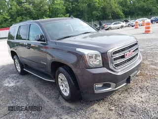 2015 GMC Yukon SLE z VIN 1GKS2AKC9FR668999, wystawiony jako IAAI lot #42490994 z przebiegiem 187 418 mil mil oraz . Historia ofert i sprzedaży dostępna na DreamBid. Obrazek 1.