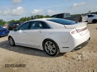 2013 Lincoln MKZ Hybrid с VIN 3LN6L2LU7DR801618, выставлен на аукционе Copart как лот 60061685 с пробегом 142 610 миль миль и Списание • Salvage title. История ставок и продаж доступна на DreamBid. Изображение 2.