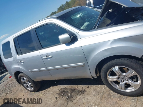 2013 Honda Pilot EX-L with VIN 5FNYF3H59DB022797, listed as a IAAI auction lot 41880675 with 206,359 mi miles and . Bid and sale history available at DreamBid. Image 13.