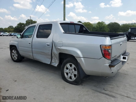 2006 Honda Ridgeline RTL with VIN 2HJYK16516H562690, listed as a Copart auction lot 66073094 with 211,924 mi miles and Salvage Title. Bid and sale history available at carsss.com. Image 2.