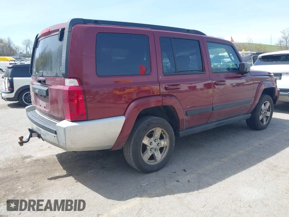 2007 Jeep Commander Sport with VIN 1J8HG48K27C661932, listed as a IAAI auction lot 42132895 with 255,707 mi miles. Bid and sale history available at carsss.com. Image 4.