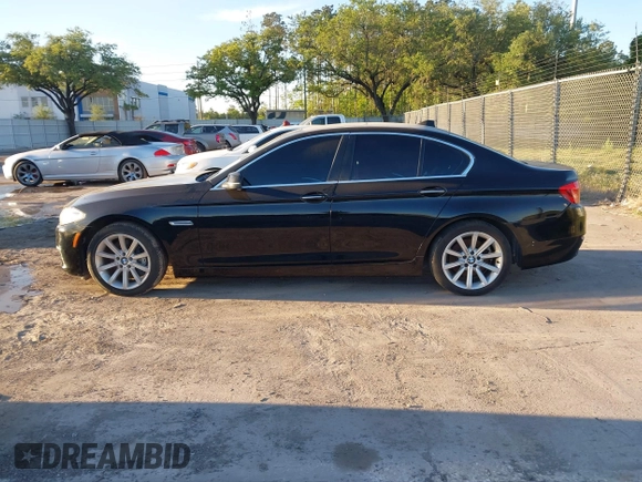 2014 BMW 5 Series 535i with VIN WBA5B1C58ED479424, listed as a IAAI auction lot 41852395 with 147,351 mi miles and . Bid and sale history available at DreamBid. Image 13.