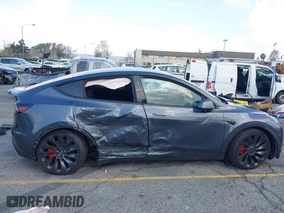 2023 Tesla Model Y Performance with VIN 7SAYGDEF6PF837174, listed as a IAAI auction lot 41436629 with 22,799 mi miles and . Bid and sale history available at DreamBid. Image 14.