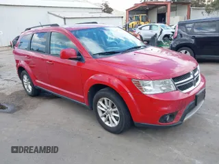 2016 Dodge Journey SXT with VIN 3C4PDDBG9GT163294, listed as a IAAI auction lot 41939520 with 166,001 mi miles. Bid and sale history available at carsss.com. Image 1.