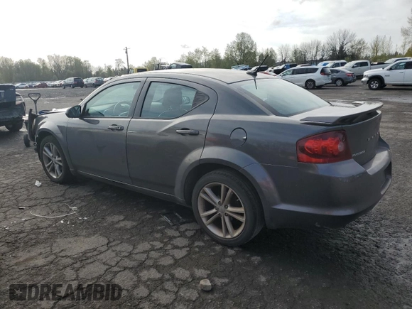 2014 Dodge Avenger SXT with VIN 1C3CDZCG1EN181798, listed as a Copart auction lot 52120655 with 156,472 mi miles and Salvage title. Bid and sale history available at DreamBid. Image 2.