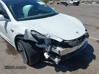 2018 Tesla Model 3 Long Range Battery with VIN 5YJ3E1EA3JF057527, listed as a IAAI auction lot 42072126 with 1 mi miles. Bid and sale history available at carsss.com. Image 18.