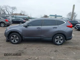 2019 Honda CR-V LX z VIN 2HKRW6H35KH212325, wystawiony jako IAAI lot #41794454 z przebiegiem 51 851 mil mil oraz . Historia ofert i sprzedaży dostępna na DreamBid. Obrazek 15.