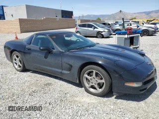 2004 Chevrolet Corvette with VIN 1G1YY22G145116083, listed as a Copart auction lot 52054735 with 158,087 mi miles and Salvage Title. Bid and sale history available at carsss.com. Image 4.