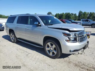2017 Chevrolet Suburban Premier with VIN 1GNSCJKC8HR232986, listed as a Copart auction lot 70196684 with 89,834 mi miles and Salvage Title. Bid and sale history available at carsss.com. Image 4.