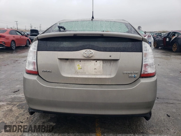 2007 Toyota Prius with VIN JTDKB20U077659487, listed as a Copart auction lot 42977135 with 191,586 mi miles and Salvage Title. Bid and sale history available at DreamBid. Image 6.