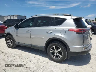 2018 Toyota RAV4 XLE with VIN 2T3WFREV7JW423768, listed as a Copart auction lot 61841875 with 111,991 mi miles and Salvage title. Bid and sale history available at DreamBid. Image 2.