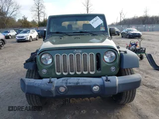 2016 Jeep Wrangler Sport with VIN 1C4AJWAG7GL330159, listed as a IAAI auction lot 41530415 with 98,554 mi miles and . Bid and sale history available at carsss.com. Image 12.