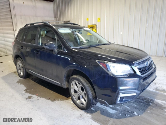 2017 Subaru Forester Touring with VIN JF2SJAWC8HH564037, listed as a Copart auction lot 87677265 with 114,986 mi miles and Salvage Title. Bid and sale history available at carsss.com. Image 4.