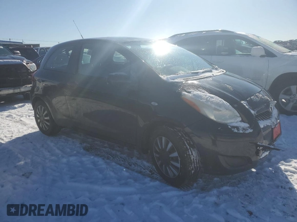 2011 Toyota Yaris with VIN JTDJT4K39B5336620, listed as a Copart auction lot 42252725 with 84,623 mi miles and Salvage Title. Bid and sale history available at carsss.com. Image 4.