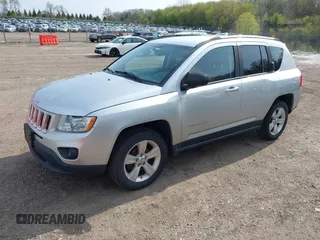 2013 Jeep Compass Sport with VIN 1C4NJDBB4DD119077, listed as a IAAI auction lot 42142532 with 131,679 mi miles. Bid and sale history available at carsss.com. Image 2.