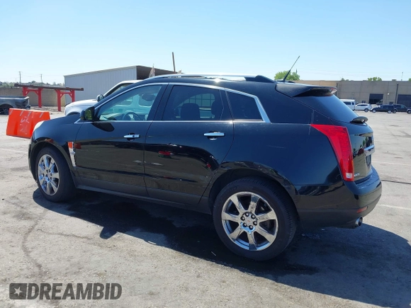 2012 Cadillac SRX Performance Collection z VIN 3GYFNBE30CS659973, wystawiony jako IAAI lot #42555119 z przebiegiem 141 842 mil mil oraz . Historia ofert i sprzedaży dostępna na DreamBid. Obrazek 14.