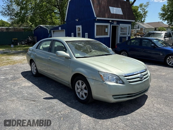 2007 Toyota Avalon XL with VIN 4T1BK36B87U233250, listed as a Copart auction lot 56004175 with 140,945 mi miles and Clean Title. Bid and sale history available at DreamBid. Image 1.