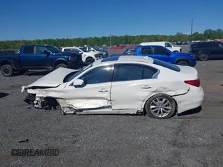 2015 Infiniti Q50 z VIN JN1BV7AR9FM413538, wystawiony jako IAAI lot #42115540 z przebiegiem 116 620 mil mil oraz . Historia ofert i sprzedaży dostępna na DreamBid. Obrazek 14.