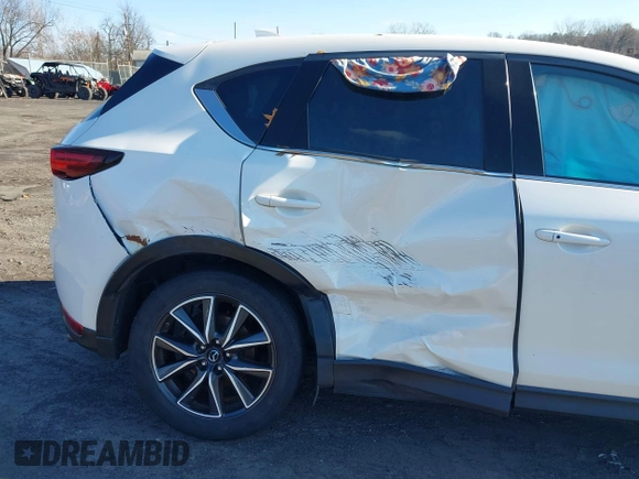 2017 Mazda CX-5 Grand Touring with VIN JM3KFBDL6H0188517, listed as a IAAI auction lot 41093178 with 98,831 mi miles. Bid and sale history available at carsss.com. Image 6.