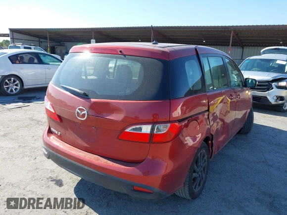 2014 Mazda 5 Sport with VIN JM1CW2BL9E0168662, listed as a IAAI auction lot 42726429 with 145,190 mi miles and . Bid and sale history available at DreamBid. Image 4.
