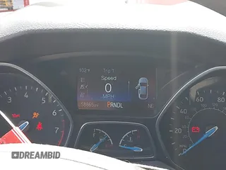 2017 Ford Focus SE z VIN 1FADP3F26HL305624, wystawiony jako IAAI lot #42411111 z przebiegiem 58 865 mil mil oraz . Historia ofert i sprzedaży dostępna na DreamBid. Obrazek 7.