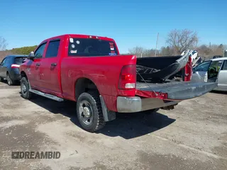 2012 Ram 2500 ST with VIN 3C6TD5CT6CG200358, listed as a IAAI auction lot 41806692 with 143,390 mi miles. Bid and sale history available at carsss.com. Image 3.