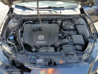 2015 Mazda 3 i Sport z VIN 3MZBM1U70FM215164, wystawiony jako Copart lot #57527785 z przebiegiem 144 621 mil mil oraz Szkoda całkowita • Salvage title. Historia ofert i sprzedaży dostępna na DreamBid. Obrazek 11.
