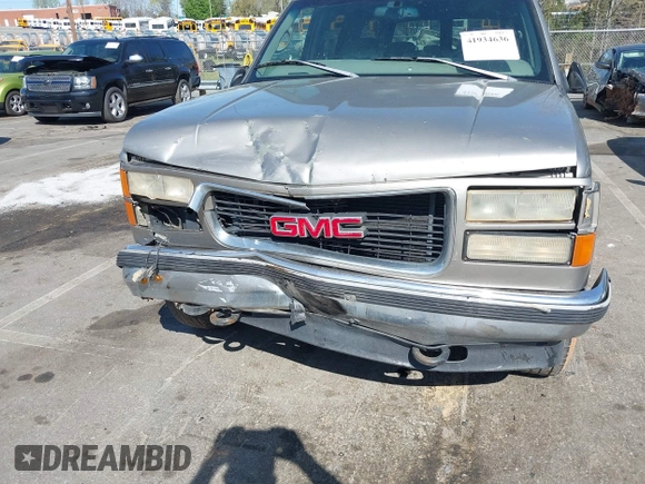 1999 GMC Suburban with VIN 3GKFK16R4XG514928, listed as a IAAI auction lot 41934636 with 245,010 mi miles and . Bid and sale history available at DreamBid. Image 6.