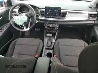 2023 Kia Rio S with VIN 3KPA24AD2PE623368, listed as a Copart auction lot 66708084 with 9,442 mi miles and Salvage Title. Bid and sale history available at carsss.com. Image 8.