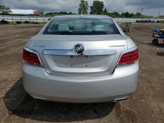 2013 Buick LaCrosse z VIN 1G4GA5E35DF128714, wystawiony jako Copart lot #61446425 z przebiegiem 128 419 mil mil oraz Szkoda całkowita • Salvage title. Historia ofert i sprzedaży dostępna na DreamBid. Obrazek 6.