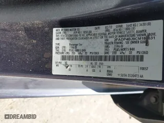 2012 Ford Fiesta SE with VIN 3FADP4BJ9CM180631, listed as a IAAI auction lot 41764566 with 103,554 mi miles. Bid and sale history available at carsss.com. Image 9.
