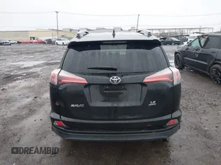 2018 Toyota RAV4 LE with VIN 2T3BFREV2JW788700, listed as a IAAI auction lot 41986212 with 87,704 mi miles. Bid and sale history available at carsss.com. Image 15.