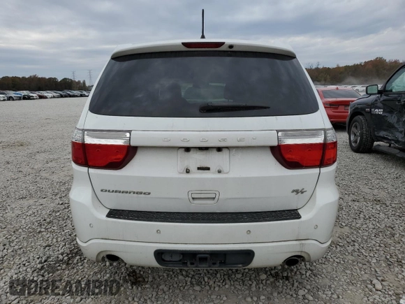 2013 Dodge Durango R/T with VIN 1C4SDHCT0DC648668, listed as a Copart auction lot 83211194 with 149,649 mi miles and Salvage title. Bid and sale history available at DreamBid. Image 6.
