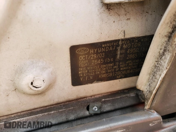 2004 Hyundai Santa Fe z VIN KM8SB12B04U640985, wystawiony jako Copart lot #56584595 z przebiegiem 239 527 mil mil oraz Szkoda całkowita • Salvage title. Historia ofert i sprzedaży dostępna na DreamBid. Obrazek 12.