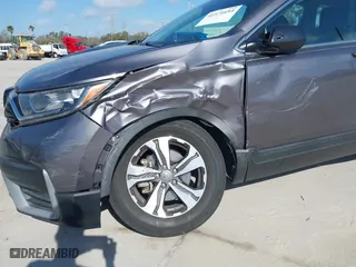 2020 Honda CR-V LX with VIN 7FARW1H29LE009775, listed as a IAAI auction lot 41571693 with 60,794 mi miles. Bid and sale history available at carsss.com. Image 6.