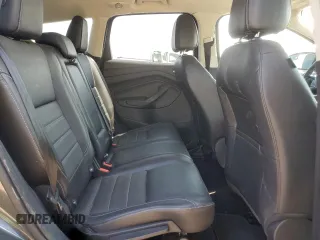 2016 Ford Escape Titanium with VIN 1FMCU9J98GUB32375, listed as a Copart auction lot 59564885 with 123,548 mi miles and Salvage title. Bid and sale history available at DreamBid. Image 10.