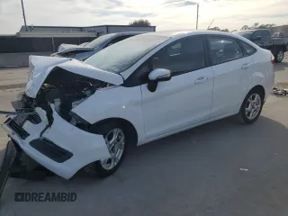 2014 Ford Fiesta SE with VIN 3FADP4BJ6EM151199, listed as a Copart auction lot 43125995 with 104,512 mi miles and Salvage Title. Bid and sale history available at DreamBid. Image 1.