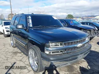 2004 Chevrolet Tahoe LS with VIN 1GNEC13T24R135899, listed as a IAAI auction lot 41539830 with 141,848 mi miles. Bid and sale history available at carsss.com. Image 1.