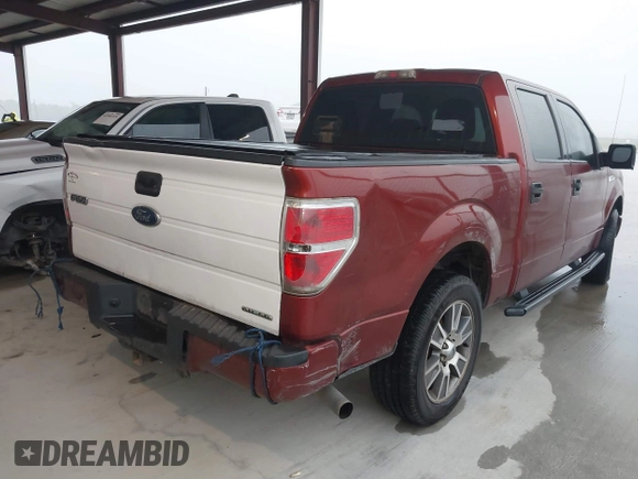 2014 Ford F-150 XL with VIN 1FTFW1CF1EKD58198, listed as a IAAI auction lot 42086106 with 401,943 mi miles. Bid and sale history available at carsss.com. Image 4.